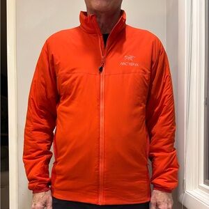 Arc’teryx Mens Atom LT insulated jacket. Burnt orange, good used condition.